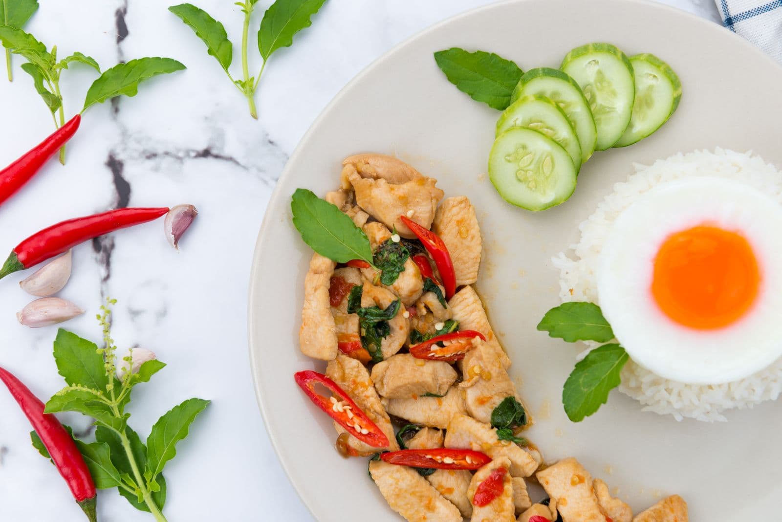 Thai basil chicken with fried egg and rice