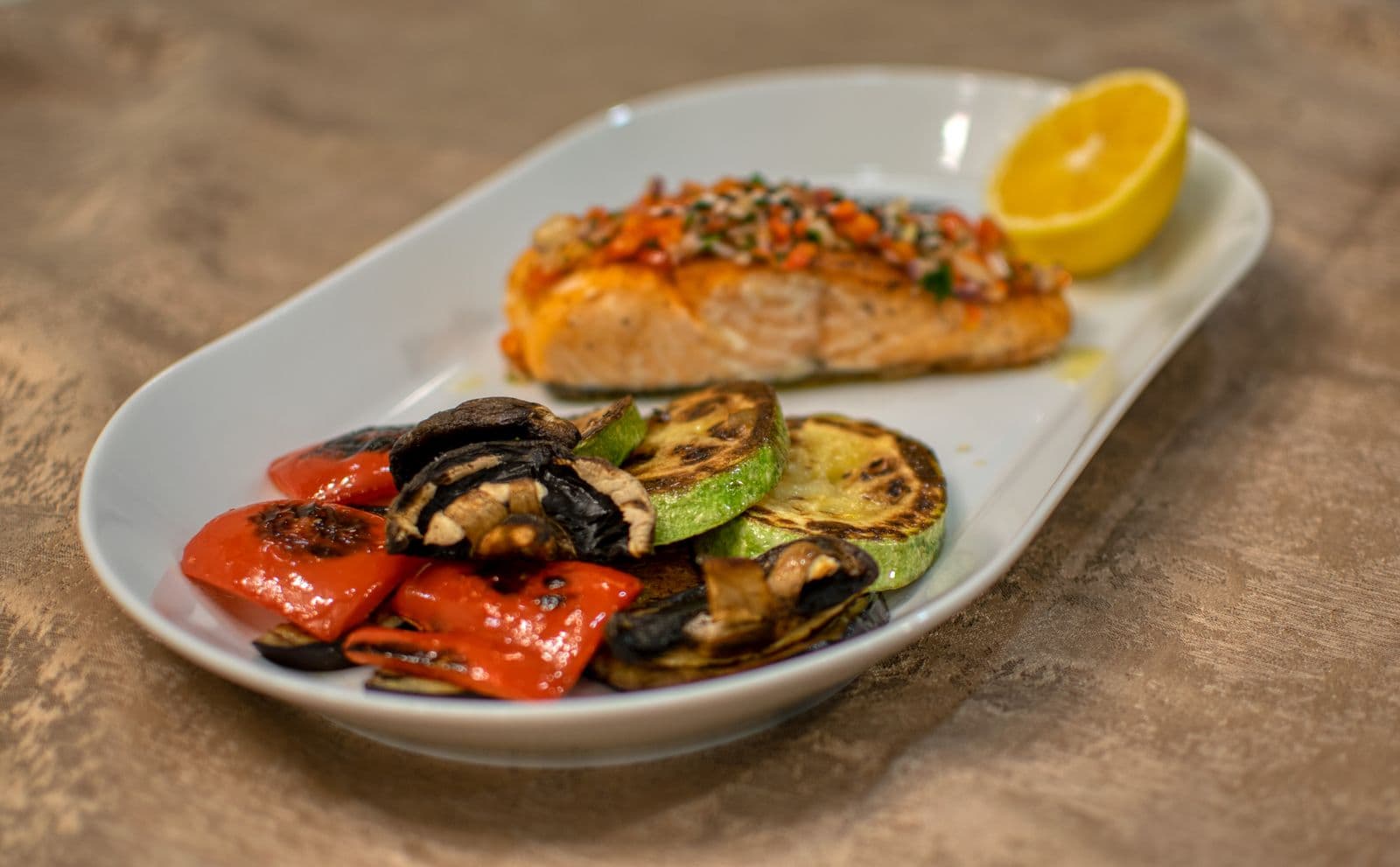Herby salmon and white fish traybake