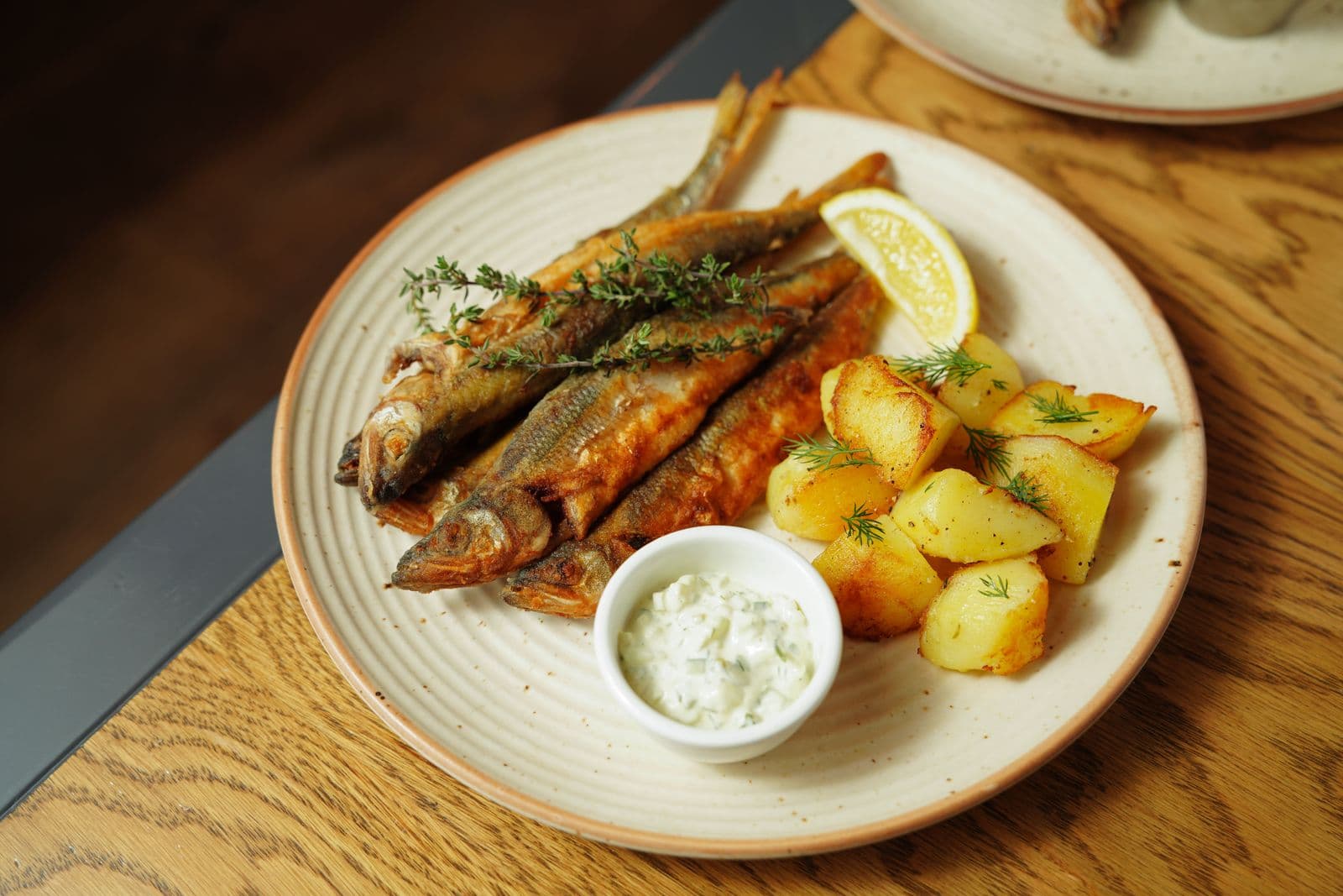 Baked fish with lemon potatoes and green beans