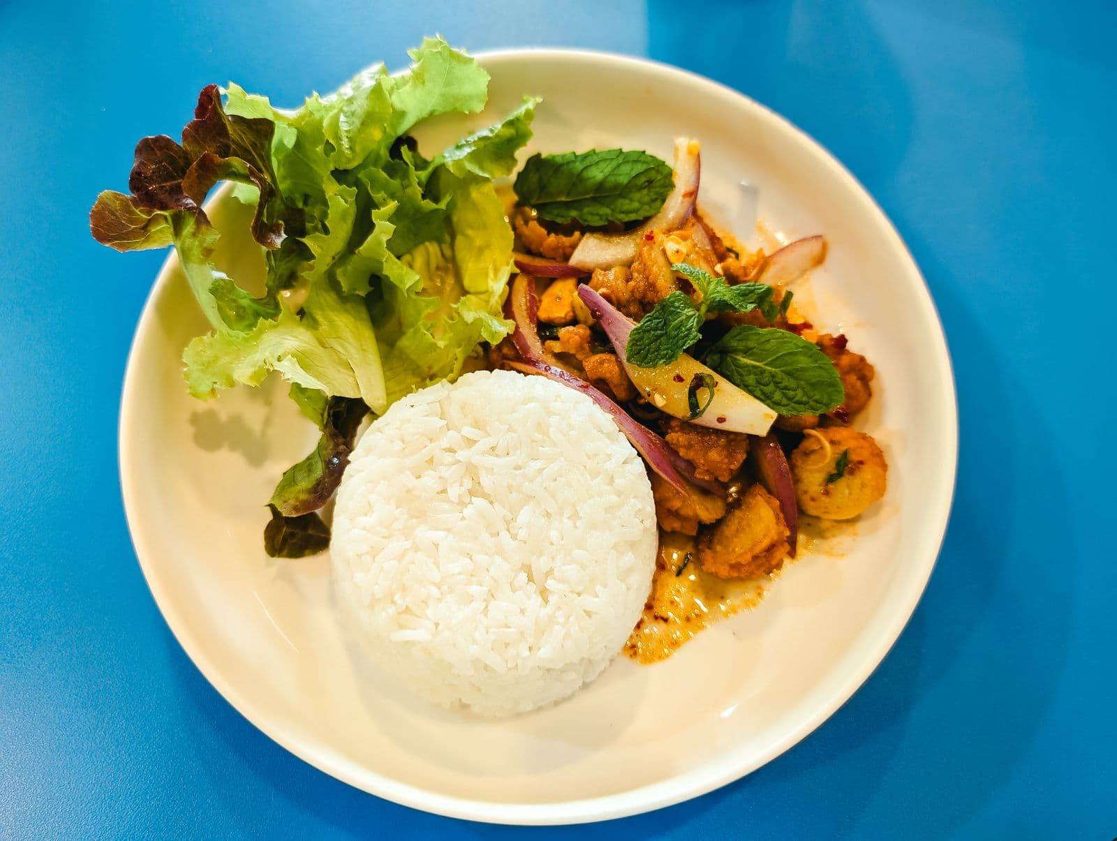 Thai chicken larb with rice and lettuce cups