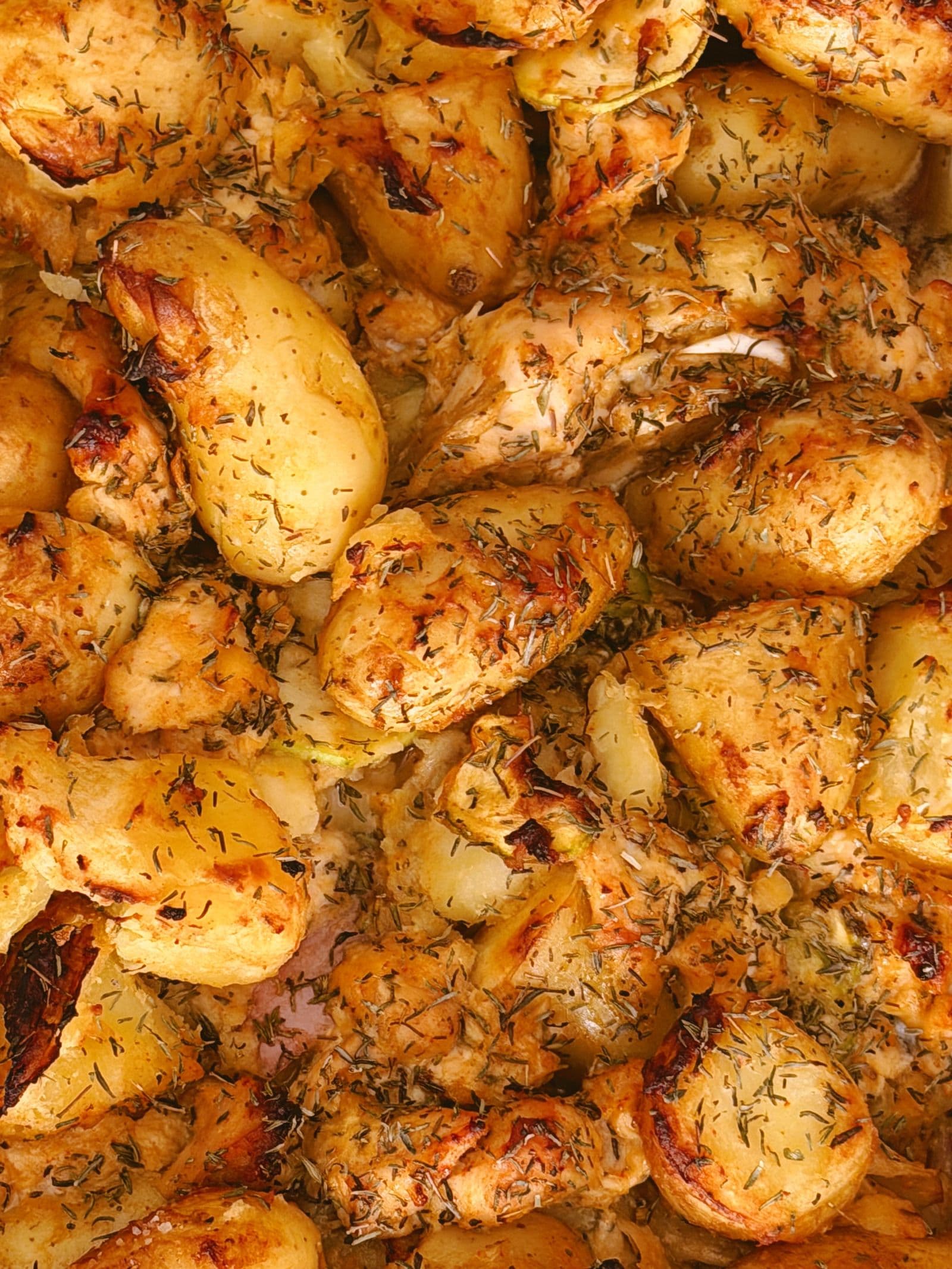 Spanish-style garlic and herb chicken with roast potatoes