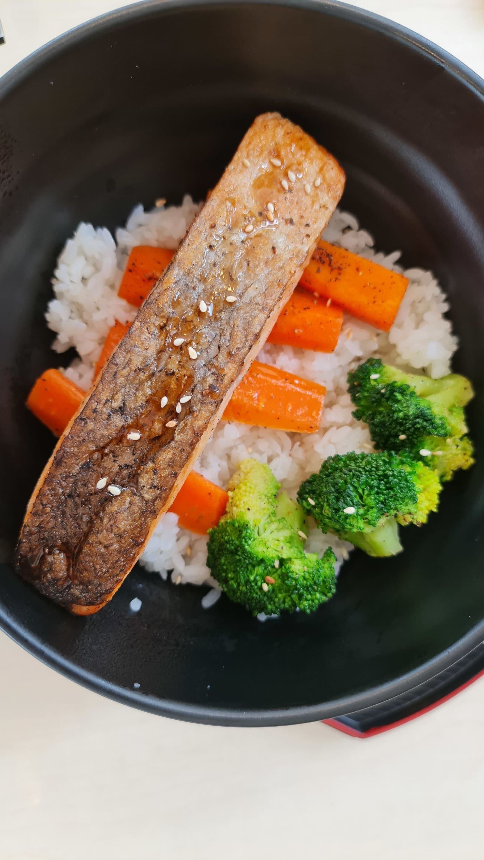 Sticky soy salmon with rice and greens